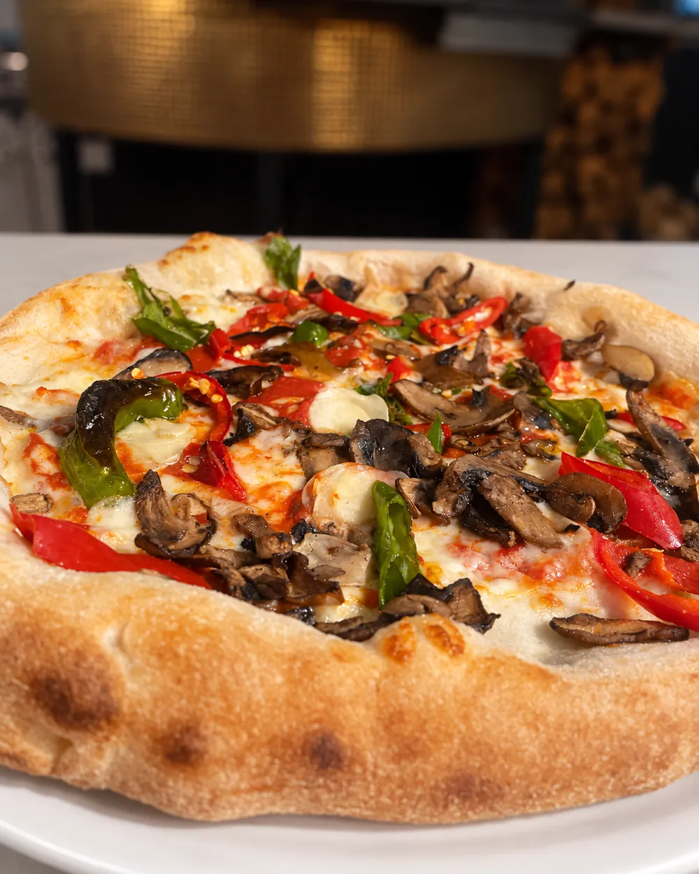Pizza with roasted mushrooms and peppers
